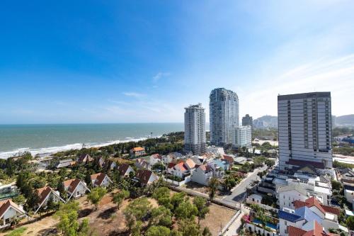 an aerial view of a city and the ocean at The Song Your Homestay Vung Tau in Vung Tau