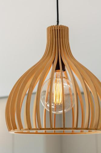 a pendant light hanging from a ceiling at Luxury Without Limits in CBD Christchurch in Christchurch