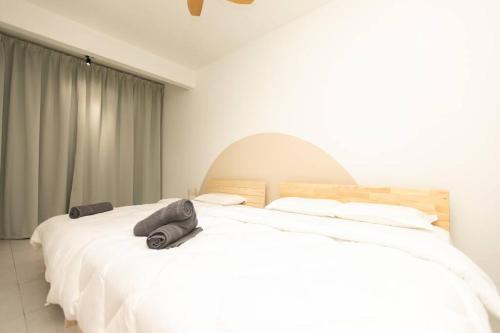 Ένα ή περισσότερα κρεβάτια σε δωμάτιο στο Top floor Seaview pent house 3BR 10pax