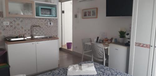 Kuchyň nebo kuchyňský kout v ubytování Casa Nave