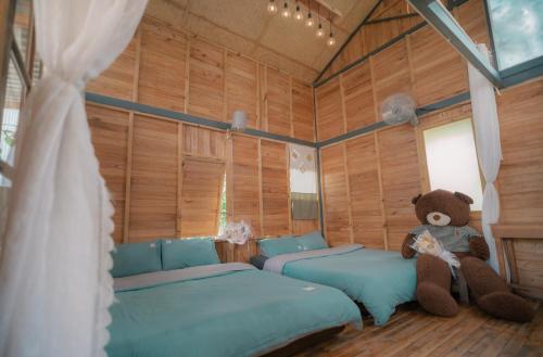 Кровать или кровати в номере Mơ Garden Retreat DaLat