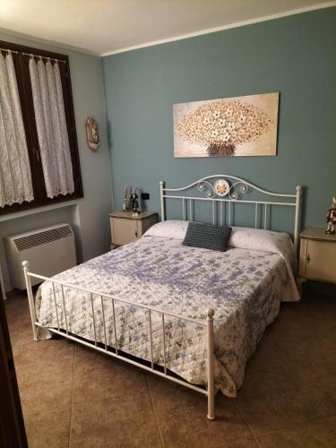 Postel nebo postele na pokoji v ubytování LA CASA DEL CILIEGIO