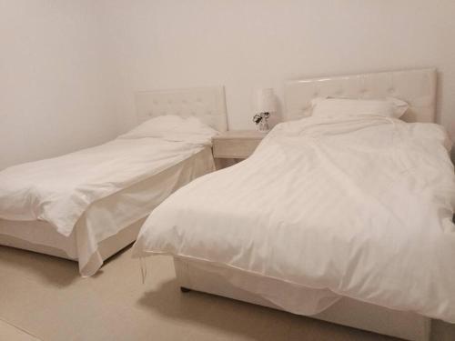 Postel nebo postele na pokoji v ubytování شقة خاصة
