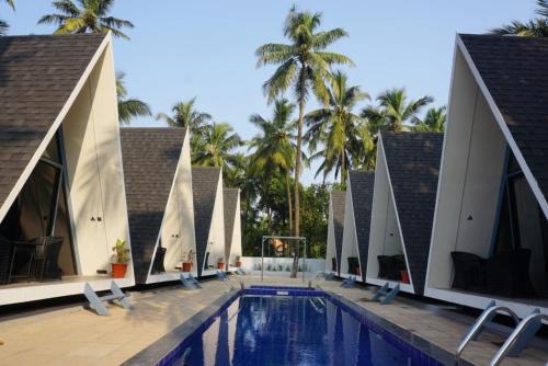 a view of the pool at the resort at NAMASTE BEACH RESORT in Jāmb