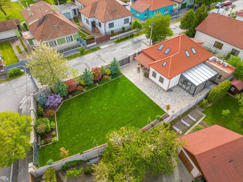 an aerial view of a house with a yard at Casa PERLA in Dunajská Streda