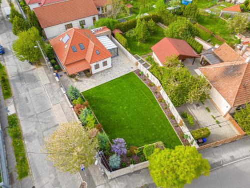 an overhead view of a house with a yard at Casa PERLA in Dunajská Streda