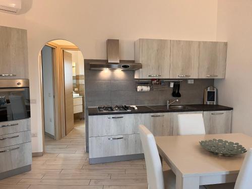 Una cocina o zona de cocina en Residenza Limpiddu