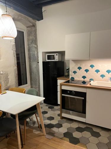 Kjøkken eller kjøkkenkrok på Le Bucolique - Cœur Vieille-ville d'Annecy