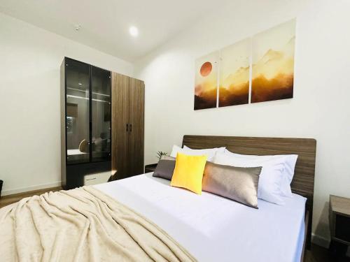 Postel nebo postele na pokoji v ubytování Mangrove Residences Mactan