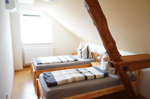Postel nebo postele na pokoji v ubytování Ferienhaus Vorwachs 4 OG