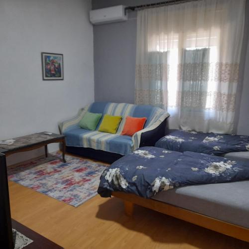 Llit o llits en una habitació de Klara Rooms