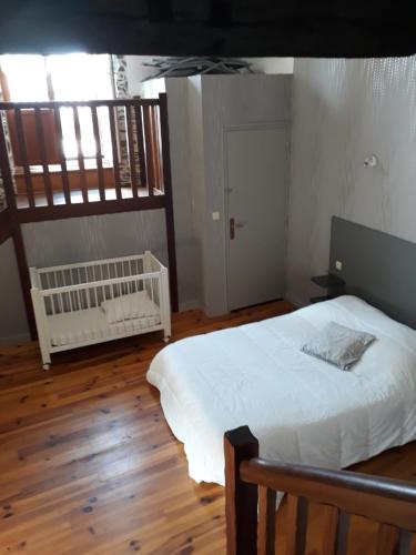 מיטה או מיטות בחדר ב-Gite spacieux avec superbe vue