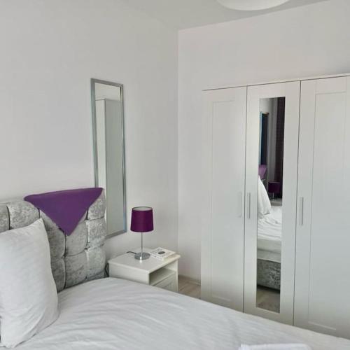 Cama ou camas em um quarto em NOAHospitality Apartment