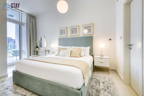 Ένα ή περισσότερα κρεβάτια σε δωμάτιο στο Elegant One Bedroom Apartment