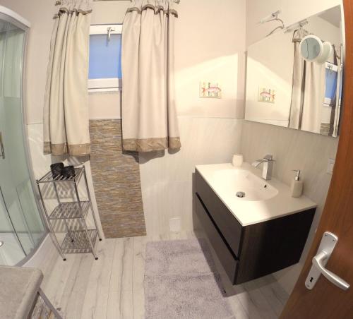 Vonios kambarys apgyvendinimo įstaigoje Appartamento in villa