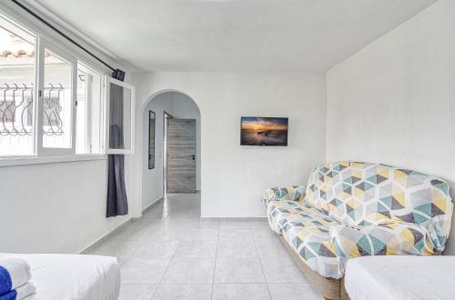 Postel nebo postele na pokoji v ubytování Bungalow Los Porches D52