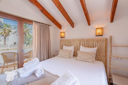 Ένα ή περισσότερα κρεβάτια σε δωμάτιο στο Villa Solmar