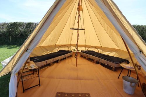a large tent with two beds in it at Rescorla Retreats - Wisteria in St Austell