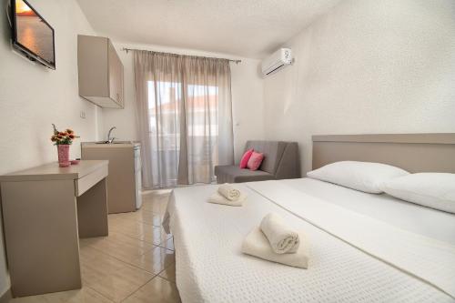 Postel nebo postele na pokoji v ubytování Studio & Apartments More