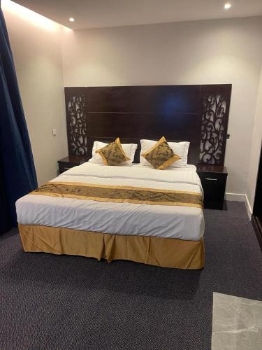 Кровать или кровати в номере Badeel Alawal