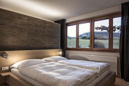 Ліжко або ліжка в номері Wälder Vakanz - Urlaubsdomizil für Genießer