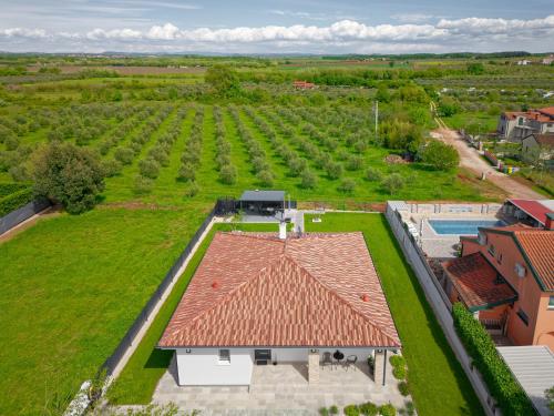 an aerial view of a house with a roof at Villa Tea by Rent Istria in Umag