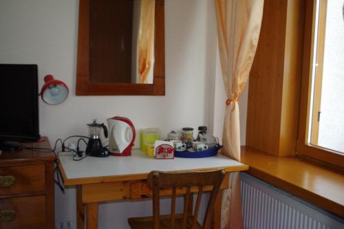 Kuchyň nebo kuchyňský kout v ubytování ROOM AURORA