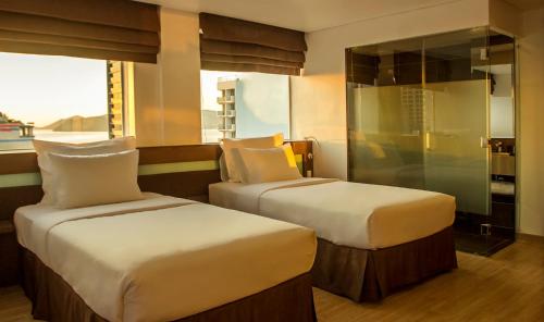 Кровать или кровати в номере Ocean View Nha Trang