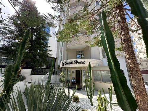 a building with a sign that reads secret rock at Savk Hotel in Alanya