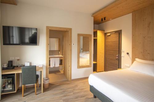 Un ou plusieurs lits dans un hébergement de l'établissement Chalet Cridola Dolomiti Experience
