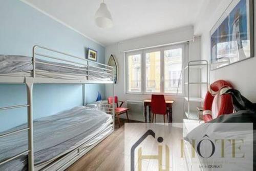 En eller flere senge i et værelse på Digue de Mer - Appt Vue Mer 3CH Balcon, Bray-Dunes