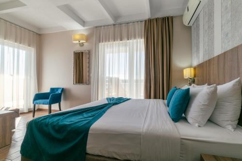 Krevet ili kreveti u jedinici u okviru objekta Hotel Sato Conference & SPA Resort