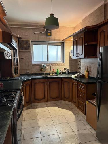 Una cocina o zona de cocina en Maadi Serenity:3BR Inviting Home