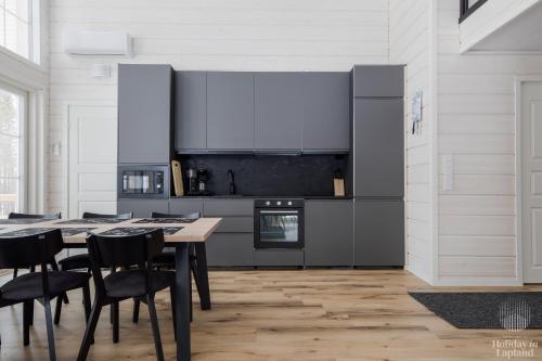 Køkken eller tekøkken på Holiday in Lapland - Villa Lapintuuli