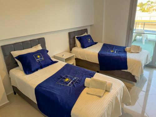 Ένα ή περισσότερα κρεβάτια σε δωμάτιο στο Lavender Residence