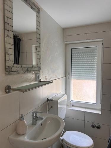 Koupelna v ubytování Ferienwohnung Wilhelmshaven