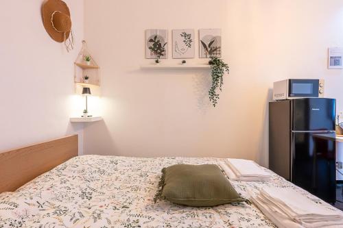Кровать или кровати в номере Il Nido Verde_Zona Porta Susa