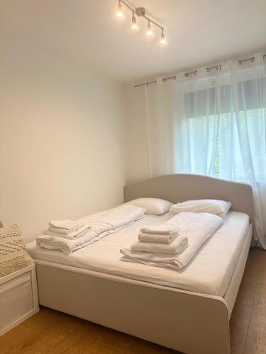Postel nebo postele na pokoji v ubytování Appartement Lena