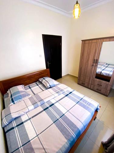 Katil atau katil-katil dalam bilik di COMFORT B&B