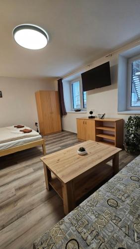 Postel nebo postele na pokoji v ubytování Apartmány U Provazníka