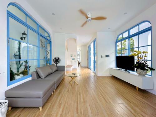 a living room with a couch and a flat screen tv at Serena Villa, Da Nang, Viet Nam, 3 bedrooms - Vietnam in Da Nang