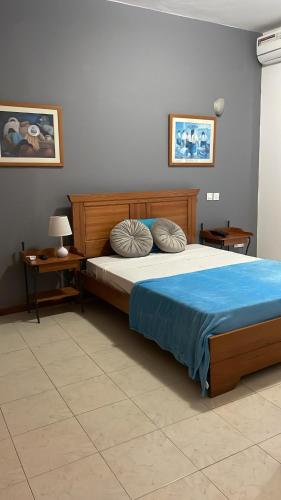 Postel nebo postele na pokoji v ubytování Felicidade Hotel