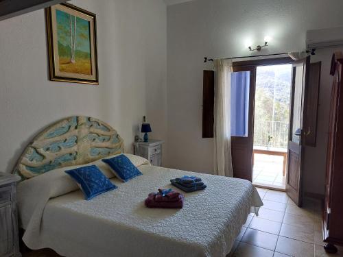 Postel nebo postele na pokoji v ubytování Hotel Valle del Cedrino