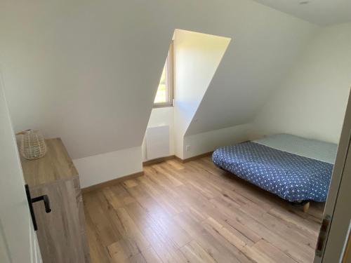 Postel nebo postele na pokoji v ubytování Location saisonnière