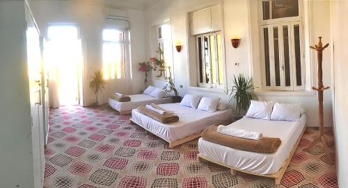 Ένα ή περισσότερα κρεβάτια σε δωμάτιο στο Alam B&B Luxor
