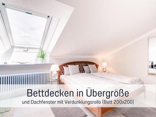 a bedroom with a bed and a window at Ferienhaus Bauer in Piding in Piding