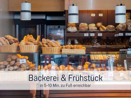 a bakery with lots of bread and pastries on display at Ferienhaus Bauer in Piding in Piding