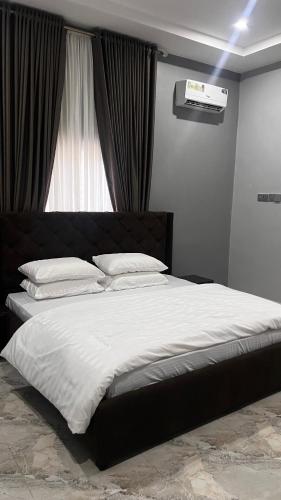 Posteľ alebo postele v izbe v ubytovaní Apartment One One