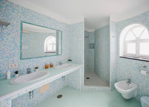 Ένα μπάνιο στο La Canostra Home - luxury villa