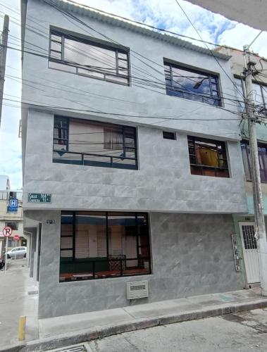 a building with windows on the side of it at HOSPEDAJE SiLOM in Bogotá